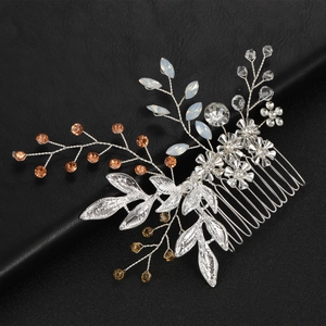 Elegant silver bridal hair comb with rhinestones and orange beads on black leather