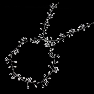 Handmade bridal hair vine with white pearls and crystals on silver wire for wedding hairstyles