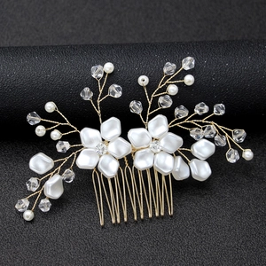 Elegant gold bridal hair comb with white pearl flowers and faceted clear crystals