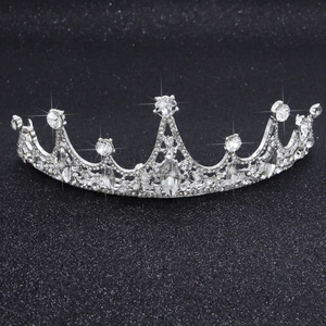 Sparkling silver tiara with white rhinestones and large teardrop crystal center