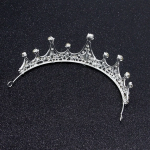 Elegant silver bridal tiara crown with sparkling rhinestones for princess wedding hairstyle