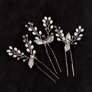 Baroque silver leaf bridal hair pin set with white pearls and sparkling crystals