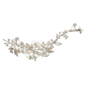 Detail of bridal headband with white fabric flowers, pearls and rhinestone leaves