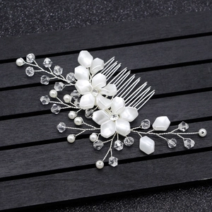 Elegant bridal hair comb with white pearl flowers and crystal beads on silver wire