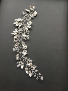 Detail of bridal vine hairpiece with marquise crystals and silver wire weaving