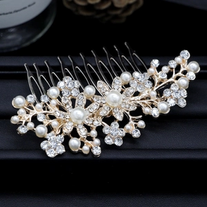 Exquisite bridal hair comb with pearls and crystals in a floral design for weddings