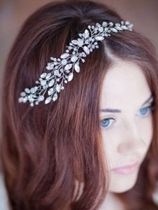 Detail of silver bridal hair vine with crystal beads and rhinestones on hair