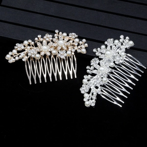 Elegant bridal hair comb with pearls and crystals in gold and silver floral design