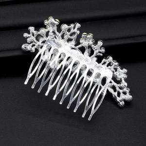 Detailed back view of a silver-tone floral bridal hair comb showing the 10-tooth metal structure