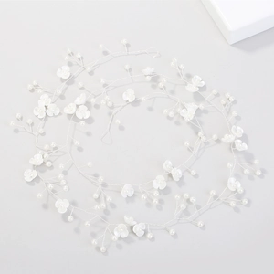 Detail of 1 meter bridal headband with handmade shell flowers and pearl beads on silver wire