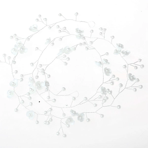 Detail of 1-meter handmade bridal hair vine with pearls and resin flowers on silver wire