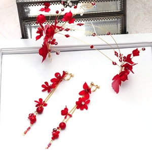 Red bridal floral headpiece and tassel earrings set for traditional wedding attire