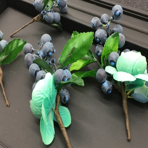 Floral bridal hair accessory with blue berries, mint green roses and silk green leaves
