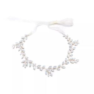 Elegant vine style bridal headband with light blue faux gemstone leaves and silk ribbons