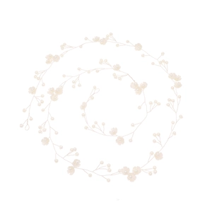 Macro detail of 1-meter bridal hair chain with pearls and shell flower petals