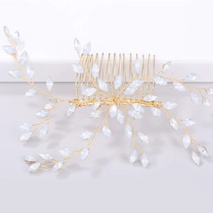 Elegant gold bridal hair comb with handcrafted opal vine leaves for wedding hairstyles