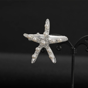 Elegant silver starfish hair clip with white pearls and sparkling rhinestones for brides