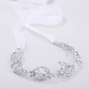 Elegant silver bridal headband with crystal floral vine and white organza ribbon ties