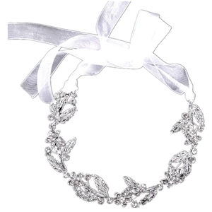 Detailed view of silver bridal headband with crystal floral motifs and white silk ribbons
