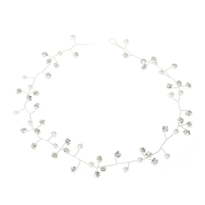 Detail of silver bridal hair vine featuring white faux pearls and faceted rhinestones
