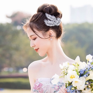 Elegant silver leaf rhinestone bridal hair comb and star earrings set for wedding styling