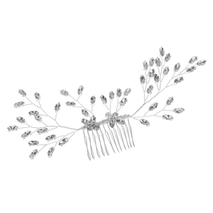 Macro shot of silver bridal hair comb featuring flexible wires and clear crystal rhinestones