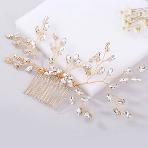 Elegant gold bridal hair comb with crystal marquise leaf design for wedding hairstyles