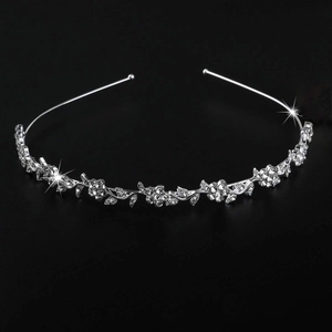 Silver bridal headband with sparkling rhinestone flowers and leaves on a black background