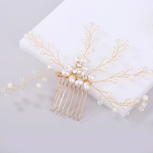 Handmade bridal hair comb with elegant white pearls and crystals in a golden wire design