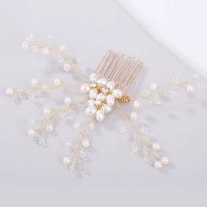 Elegant bridal hair comb with gold wires, white pearls, and sparkling crystals for weddings