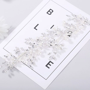 Elegant bridal hair vine with shimmering crystals and pearls on silver flexible wire