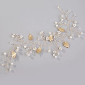Elegant gold leaf and pearl bridal hair vine with crystal beads for wedding hairstyles