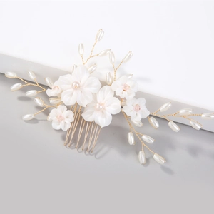 Handmade bridal hair comb with white flowers, pearls and golden wire for weddings