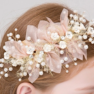 Elegant floral girls' headpiece with pearls, pink mesh bow and sparkling rhinestones