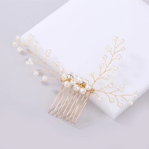 Elegant bridal gold hair comb with white pearls and crystals in a branch design