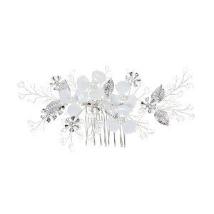 Detail of silver bridal hair comb with white flowers, pearls, and crystal beads