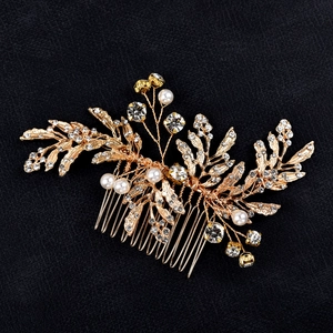 Handmade bridal hair comb with gold alloy leaves, white pearls and sparkling rhinestones