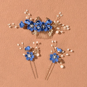 Detailed set of blue fabric flower hair comb and pins with gold leaves and pearls