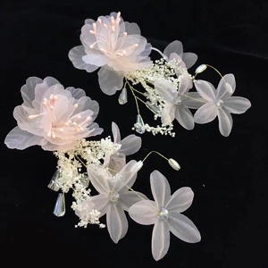 Pink tulle flower hair clips with white baby's breath and acrylic beads for weddings