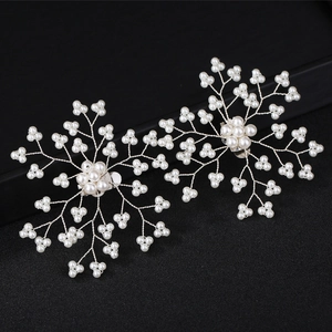 Handmade pearl snowflake shoe clips and bridal hair accessories in silver wire set of two