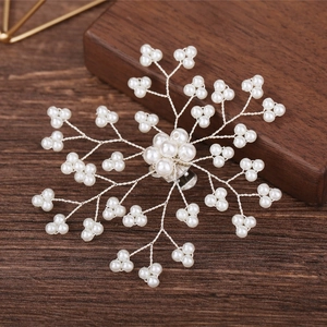 Handmade snowflake pearl shoe clips and bridal hair accessories in silver metal finish