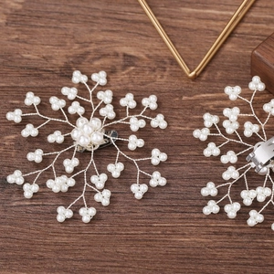 Handmade pearl snowflake shoe clips and hair accessories for bridal wedding styling