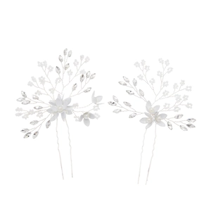 Handmade bridal hair pins with white pearls, crystals, and silver flowers for weddings