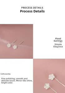 Macro detail of polished S925 sterling silver camellia flower earrings with mirror finish
