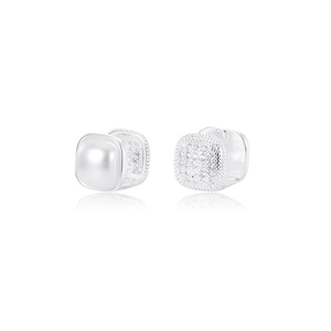 Elegant silver earrings featuring a glossy white pearl and fine textured pavé metal surface