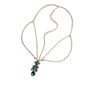 Bijou de tête bohème doré avec pendentif cristal vert pour coiffure de mariée élégante