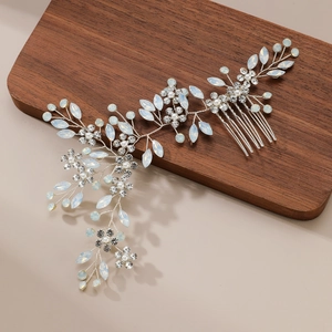 Silver bridal hair comb with crystal flowers and pearls for wedding hairstyles