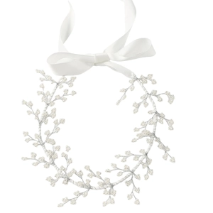 Elegant bridal hairband with white pearls and silk ribbon bow for wedding hair accessories