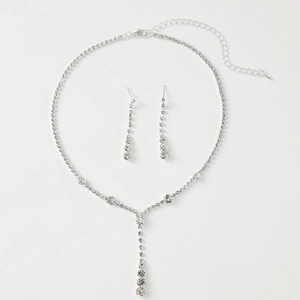 Elegant bridal jewelry set with silver crystal necklace and matching drop earrings for wedding