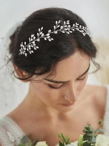 Close-up of silver bridal hair vine with marquise crystals and rhinestones for wedding hair